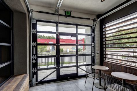 Walk Through Garage Door, Garage Glass Doors, Glass Garage Door Patio, Clear Garage Doors, Double Wide Manufactured Homes, Wedding Winery, Glass Garage, Small Salon, Garage Storage Inspiration