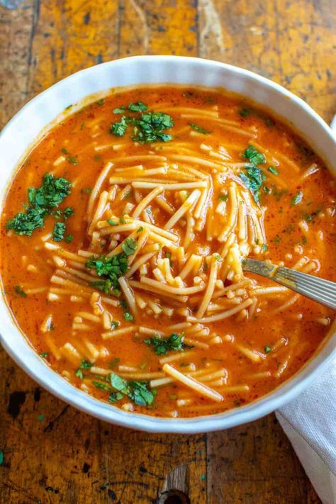 An authentic Sopa de Fideo recipe, you will be surprised how easy, quick and delicious this soup is. It’s one of Mexico’s most classic soup recipes made with tomatoes, noodles, garlic, and broth. Loved by kids and adults alike. Vegan Fideo Soup, Tomato Soup And Noodles, Easy Stovetop Soup, Tomato Bullion Recipes, Soups Without Meat, Chicken Fideo Soup, Authentic Fideo Recipe Mexican, Spaghetti Soup Recipes Ground Beef, Mexican Pasta Soup