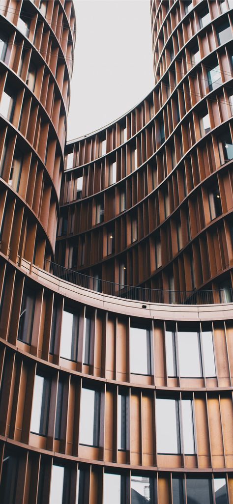 close up photography of brown concrete building Curved Building, Arquitectura Wallpaper, Architecture Photography Buildings, Denmark Copenhagen, Architecture Wallpaper, Architecture Images, Modern Architects, Concrete Building, Dslr Background Images