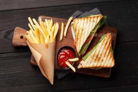 Potato fries and club sandwich by karandaev. Potato fries chips and club sandwich. Fast food take away. Top view #Sponsored #sandwich, #karandaev, #club, #Potato Clubhouse Sandwich, Chips Potato, Coffee Bread, Club Sandwich, Potato Fries, Food Displays, Healthy Sweets Recipes, Indian Snacks, Fried Potatoes