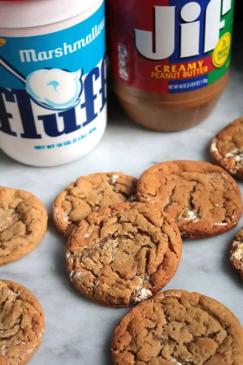 If you're a fan of fluffernutter you're going to love these peanut butter marshmallow fluff cookies. With visible streaks of marshmallow creme, these are the chewiest peanut butter cookies! Marshmallow Fluff Cookies, Fluff Cookies, Peanut Butter Marshmallow Fluff, Christmas Dinner Dishes, Stuff Cookies, Sweets To Make, Cookies Peanut Butter, Peanut Butter Marshmallow, Marshmallow Cookies