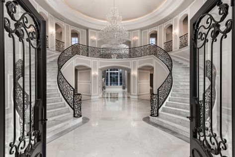 Talk about a grand entrance! This double staircase will leave all of your guests speechless.    #luxury #customhomes #homeoftheday #hgtv #designer #style #happythursday #TBT #goals #home #realestate #realtors #arizona #dream #dreamhome #success #speechless #inlove Luxury Staircase, Double Staircase, Hiasan Bilik Tidur, Luxury House Interior Design, Marble Flooring, Home Stairs Design, Luxury Estate, Mansion Interior, House Stairs