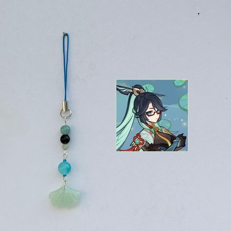 Xianyun phone charm with amazonites and fumè quartz 🪽 ★彡[ꜱʜᴏᴘ ʟɪɴᴋ ɪɴ ʙɪᴏ]彡★ Handmade with ʀᴇᴀʟ ᴄʀʏꜱᴛᴀʟꜱ. ˚ ༘♡ ⋆｡˚𝓲𝓰𝓷𝓸𝓻𝓮 𝓽𝓱𝓮 𝓽𝓪𝓰𝓼 ˚ ༘♡ ⋆｡˚ #genshin #genshinimpact #genshinimpactedit #genshinimpactfanart #genshinimpactmihoyo #mihoyo #hoyolab #handmade #beads #explore #explorepage #navia #yaemiko #raidenshogun #hutao #fyp #phonecharm #phonestrap #smallbiz #smallbusiness #beads #xiao #furina #xianyun #neuvillette #venti #nahida #zhongli #kazuha Genshin impact phone charms Kazuha Genshin Impact, Kazuha Genshin, Phone Charms, Handmade Beads, Phone Charm, Pretty Jewellery, Handmade Shop, Genshin Impact, Etsy App