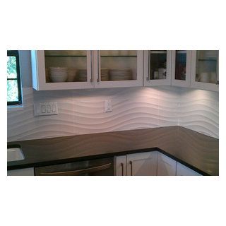 Custom Surface Solutions - Owner Craig Thompson (512) 430-1215. This album shows a kitchen backsplash with UBkitchen cabinets, large 35" x 12.5" white wave 3d Tile Backsplash Kitchen, White Glass Backsplash, Large White Tiles, Craig Thompson, White Tile Kitchen Backsplash, Glass Backsplash Kitchen, Kitchen Splash Back, Trendy Kitchen Backsplash, White Tile Backsplash