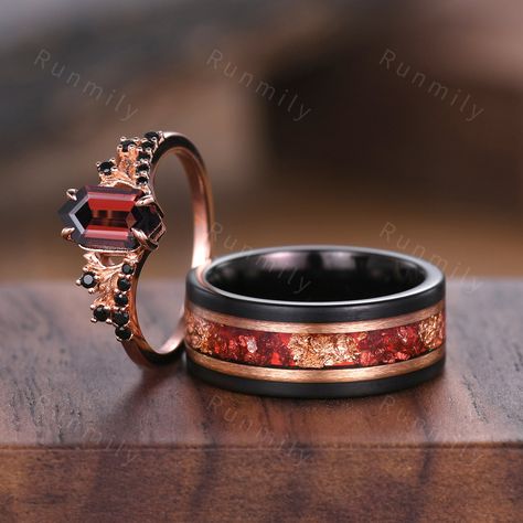 Here we have a Vintage garnet couples ring set rose gold matching promise ring His and Hers wedding band Mens ruby tungsten ring anniversary ring gifts ITEM DESCRIPTION ✦ Handmade, high-quality item! ✦ Material: Sterling Silver/Solid Gold/Tungsten ►Sold as a two-piece set ►His ring is Black Tungsten Carbide with rose gold leaf and ruby inlay. ►His band width: 8mm ►His tungsten ring will not turn green itself and will not cause your skin to turn green.  ✦ Durable - Incredibly Scratch-Resistant to Couples Rings Matching, Wedding Ring Set Gold, Matching Promise Rings, Garnet Wedding Rings, Matching Couple Rings, Wedding Orange, Couples Ring, Matching Wedding Rings, Couples Ring Set