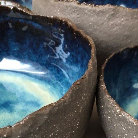 Melanie Landre on Instagram: "Bought a bag of clay for €1 ( bit dry with a hole in the bag ) , very high rough grog contents. Just simple forms but love how the blue glaze came out on the dark clay 🌊. #pottery #darkclay #ceramicglaze #ceramics #keramiek" Glaze On Dark Clay, Glazes On Black Clay, Blue Midnight Glaze, Glazes On Brown Speckled Clay, Dark Brown Clay Glazes, Black Clay, In The Bag, Simplest Form, The Bag