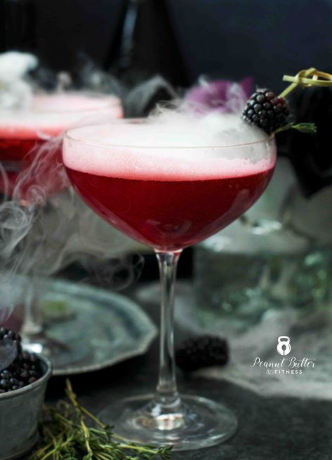 BLACKBERRY THYME PROSECCO FIZZ Blackberry Fizz, Rum Swizzle, Halloween Party Drinks, Blackberry Syrup, Prosecco Cocktails, Strawberry Mojito, Martini Recipe, Creepy Decor, Dry Ice