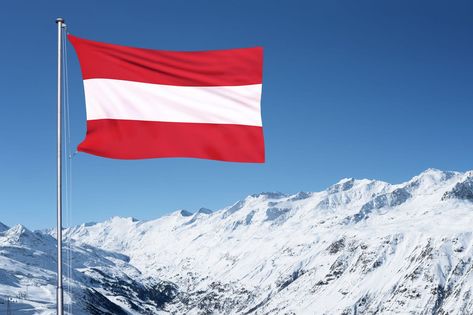 The Austrian flag flying from a metal pole in front of the Oztal Alps in Obergurgl, Austria Skiing In Austria, Obergurgl Austria, Austria Tourism, Austrian Flag, Austria Mountains Winter, Vector Background Graphics, Austria Flag, Travel Points, Ancestry Dna