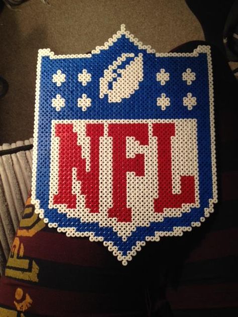 Completed NFL Logo made from Hama Beads Hoping to make a bigger one next time! Nfl Perler Beads, Buffalo Bills Perler Beads, Nfl Perler Beads Pattern, Perler Football, Logo Perler Beads, Melty Bead Patterns, Beaded Banners, Fuse Bead Patterns, 8bit Art