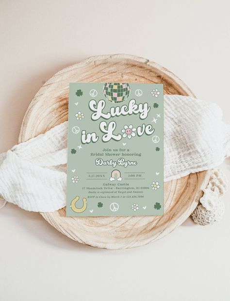 DARBY | Lucky in Love St. Patrick's Day March Retro Groovy Bridal Shower Invitation Template, Instant Download Editable Printable Invite This bridal shower invitation features various retro and groovy 70's style St. Patrick's Day illustrations such as shamrocks and four-leaf clovers paired together with fun and modern script. Personalize this template using Corjl's self-editor to edit text, font styles and color, and add in your own background color and photos! Shamrock Birthday Party, 1st Birthday March Themes, First Birthday March, First Birthday Themes March, St Pattys 1st Birthday Party, Lucky Birthday Theme, Lucky One Birthday Party Girl, The Lucky One Birthday Party, March 1st Birthday Ideas Girl