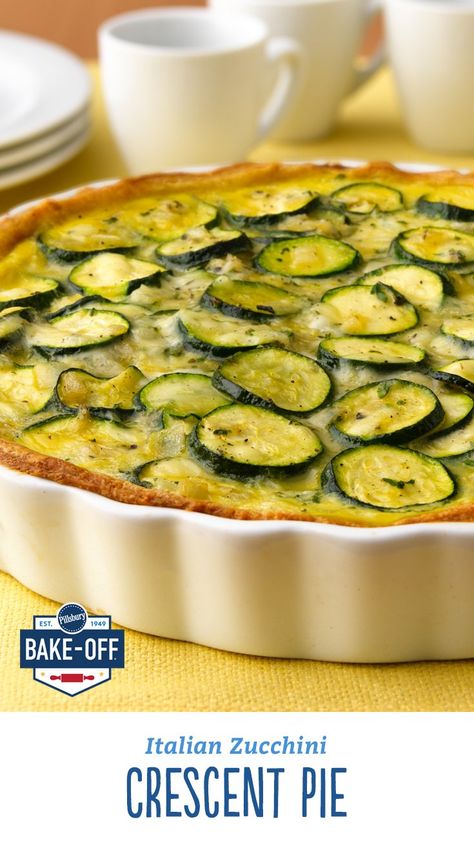 This is the perfect recipe to make with your leftover zucchini from the farmer's market. Seasoned with parsley, garlic powder, basil and oregano and mixed with cheese, this homemade quiche-inspired crescent pie is a guaranteed winner. No wonder it did so well in our Bake-Off Contest! Zucchini Quiche With Crescent Rolls, Crescent Roll Zucchini Pie, Pillsbury Zucchini Pie, Pillsbury Zucchini Crescent Pie, Zucchini Pie With Crescent Rolls, Italian Zucchini Crescent Pie, Crescent Roll Quiche, Zucchini Crescent Pie, Leftover Zucchini