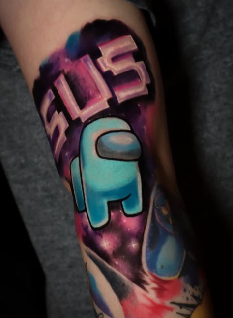 Cosmic space tattoo inspired by among us game. Cyan crewmate is sus! Tattoo full colour gap filler elbow area Among Us Tattoo, Us Tattoo, Among Us Game, Cosmic Space, Space Tattoo, Full Colour, Among Us, Tatting, Gap