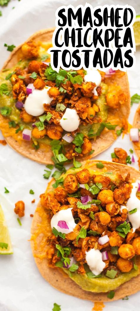 These EASY vegetarian tostadas have smashed crispy fried chickpeas for their topping - so flavorful with the perfect blend of spices! A cheesy base, guacamole and some tangy onion and cilantro round it off to the perfect combination of flavors and textures to make these meatless tostadas shine. Crispy Chickpea Tacos, Vegetarian Tostada Recipes, Meatless Tostadas, Chickpea Tostadas, Vegetarian Tostadas, Fried Chickpeas, Meatless Meals Healthy, Vegan Tacos Meat, Sweet Potato Toppings