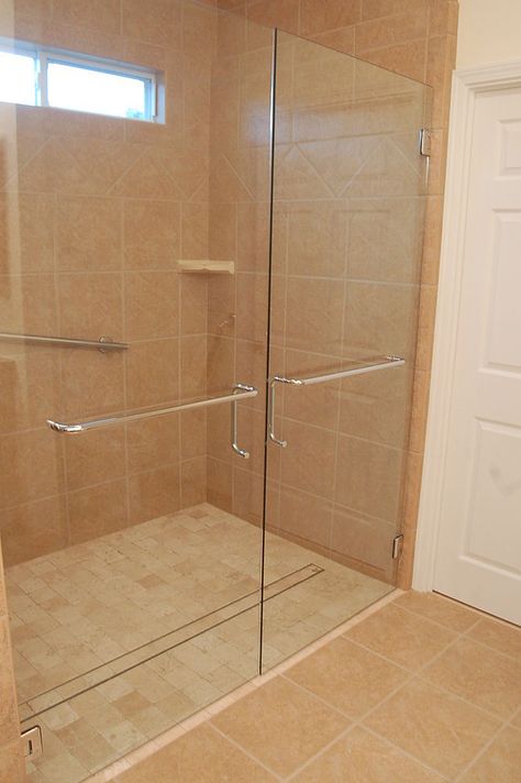 This was a unique design, we removed a 72" existing bath  and replaced it with a roll in curbless shower for two people. Wheelchair Accessible Shower, Makeover Kamar Mandi, Accessible Bathroom Design, Tub To Shower Conversion, Walk In Shower Designs, Luxury Vinyl Tile Flooring, Accessible Bathroom, Master Bath Remodel, Shower Stall