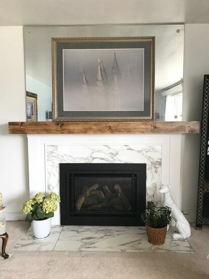 My mother in law recently decided to update her living room and trusted Nate and I to give her fireplace a little face lift. In order to achieve the look she wanted, we built her a new wood mantel! Before After painting First, I painted her fire place Valspar bistro white in an eggshell finish. Essentially, we just wrapped her existing mantel top with wood.For the top piece we used a 1x12. We measured and cut that to size, then nailed it into the existing mantel top using 1 1/… Valspar Bistro White, Diy Mantel Shelf, Mantel Diy, Mantle Design, Desk Redo, Faux Fireplace Mantels, Diy Mantel, Fireplace Mantel Surrounds, Mantle Ideas