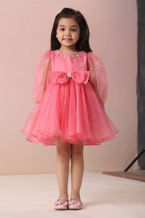 Pink dress in organza base with a bow detailed waistline and pearl embroidery on the neckline and cuffs. - Aza Fashions Organza Dress For Kids, Pink Organza Dress, Pearl Embroidery, Girls Pink Dress, Pearl Dress, Organza Dress, Dress For Girls, Dresses Pink, Pink Kids