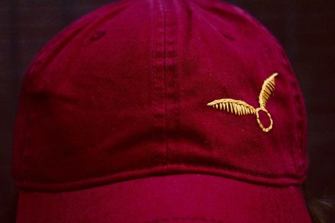 This simple Golden Snitch hat is perfect for halloween costumes or casual wear! It comes in Gryffindor colors and is one size fits all! Golden Snitch Embroidery, Gryffindor Embroidery, Gryffindor Halloween Costume, Harry Potter Quidditch, Golden Snitch, One Size Fits All, Halloween Costume, Hand Embroidered, Etsy Store