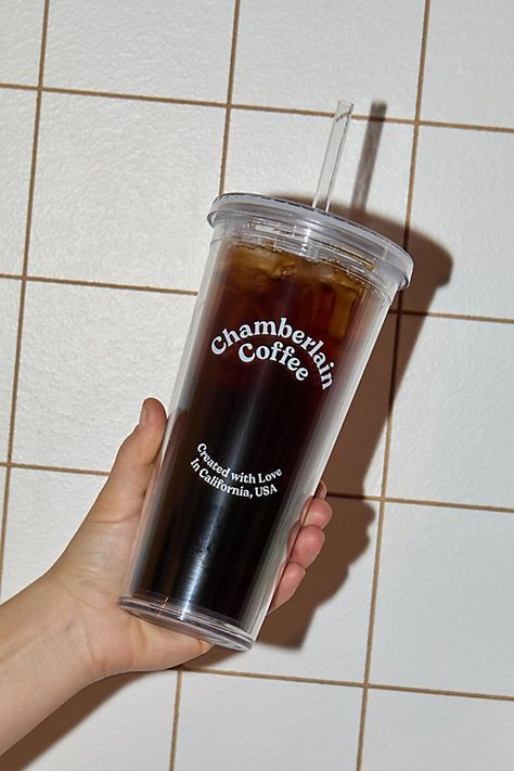 Your new go-to sipper, Chamberlain Coffee’s Travel Tumbler features a transparent design with a double wall silhouette that helps keep your beverages fresh for hours. Features Travel Tumbler from Chamberlain Coffee Transparent design Double-wall insulation Content + Care Plastic Food safe Hand wash Not dishwasher, microwave or oven safe Imported Size 24 oz Dimensions: 4.3" l x 4.2" w x 10.52" h | Chamberlain Coffee Travel Tumbler in Clear at Urban Outfitters Chamberlain Coffee, Coffee Tumblr, Custom Coffee Cup, Custom Coffee Cups, Acrylic Cups, Graphic Trends, 40 Oz Tumbler, Glass Coffee Cups, Stanley Quencher