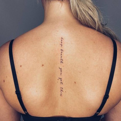 Just Breathe Spine Tattoo, Breathe Spine Tattoo, Take A Deep Breath Tattoo, Ladies Spine Tattoo, Deep Breath Tattoo, You Got This Tattoo, Back Script Tattoo, Word Spine Tattoos For Women, Bible Verse Spine Tattoo