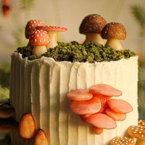 Must Love Herbs - Lauren May on Instagram: "Gingerbread Wildwood Cake with marzipan mushrooms and cake crumb moss. My birthday is in less than a month! I am currently dreaming up what my cake will look like this year. I’m positive I’ll never be able to top this one I made last year. I hand sculpted each mushroom and used a muted palette reminiscent of natures perfect tones. The pink oysters feel very girly to me which was just what I was wanting. People often ask me where I find my inspiration. Mushroom Garden Party, Fondant Toadstool, Cottage Core Party Decor, Mushroom Wedding Cake, Mushroom Cakes, Postres Aesthetic, Ghibli Birthday, Cottagecore Cake, Mushroom Cupcakes