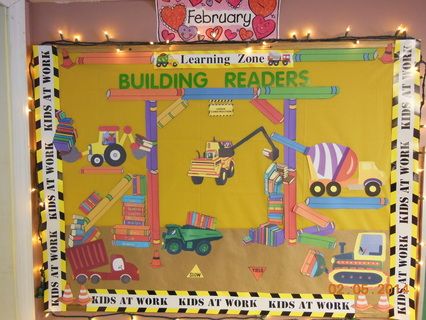 Building Readers -Construction bulletin board Construction Classroom, Construction Theme Classroom, World Bulletin Board, School Wide Themes, Literacy Week, Preschool Construction, Library Decorations, Construction Unit, Library Bulletin Board