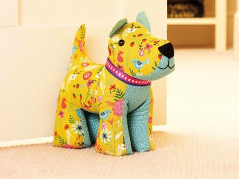 15 Unique DIY Door Stopper Ideas To Make At Home Doorstop Pattern Free, Door Stopper Diy, Doorstop Pattern, Dog Door Stop, Fabric Door Stop, Dog Sewing Patterns, Soft Toy Patterns, Animal Sewing Patterns, Sewing Stuffed Animals