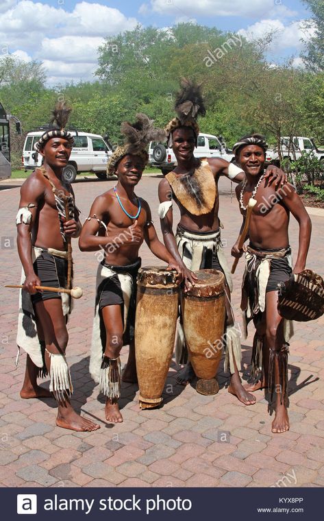 Zulu tribal performers, near Victoria Falls, Zimbabwe. Stock Photo Shona Traditional Attire, Victoria Falls Zimbabwe, Victoria Falls, Clothing Men, Traditional Attire, Zimbabwe, Traditional Dress, Zulu, Traditional Clothing