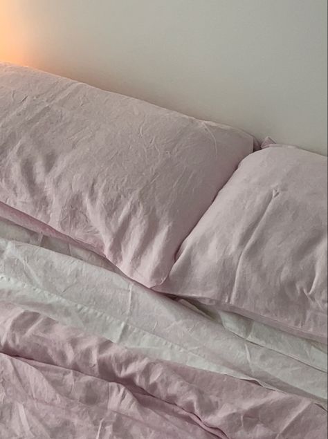 closeup of bed showing the pastel pink duvet cover and pillows with white sheets Pink And White Bedding Set, Pink And White Bed Sheets Aesthetic, Pink And White Bedsheets, Pink Comforter Aesthetic, White Pink Bedding, Pastel Linen Bedding, Pink And White Bedding Ideas, Pink And Grey Coquette, White Comforter Pink Sheets