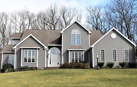 James Hardie Siding | Aged Pewter | Siding Contractors Vienna, VA Hardie Plank Colors, Hardie Shingle Siding, Hardy Plank Siding, Single Entry Doors, Composite Siding, James Hardie Siding, Hardie Siding, Fiber Cement Siding, Cement Siding