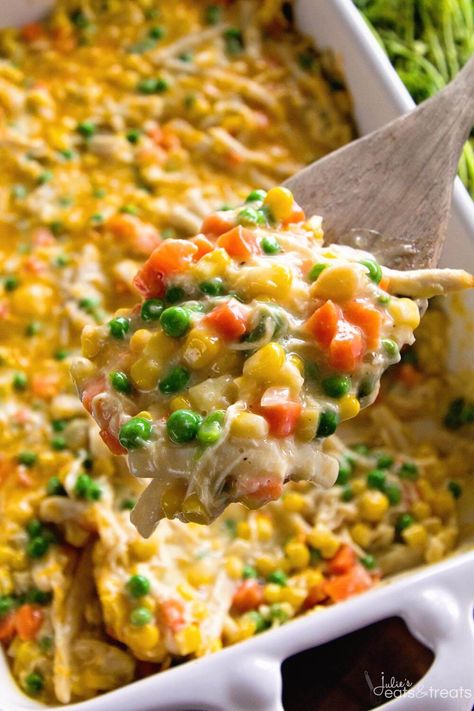 Cheesy Chicken Noodle Casserole ~ easy, hearty and comforting casserole loaded with chicken, peas, carrots, corn and egg noodles! | julieseatsandtreats.com Chicken Noodle Casserole Easy, Chicken Corn Casserole, Casserole With Corn, Cheesy Chicken Noodle Casserole, Chicken Hashbrown Casserole, Casserole Dinners, Chicken Peas, Cheesy Chicken Casserole, Chicken Tikka Masala Recipes