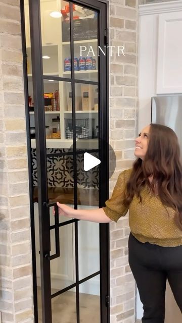 Arizona Interior Designer on Instagram: "We love love love these pantries! For the 1st pantry, we transformed a classic tract home corner pantry with a stunning steel door, a playful backsplash, and a dash of warmth with the countertops! For the 2nd pantry, we created a butler’s pantry with the most gorgeous wooden doors, charming wallpaper, lighting, and accessories! We are absolutely obsessed! What’s your favorite feature of these pantries?  ✨GUESS WHAT we are doing a special PRE-ORDER on the gorgeous sconce and pendant lighting in the 2nd pantry because it’s usually out of stock! Check it out in our stories today & the link in our bio✨" Pantry Door Inspiration, Sliding Pantry Door Ideas, Wallpaper For Pantry, Glass Door Pantry, Pantry With Glass Doors, Pantry Door Makeover, French Doors Pantry, Frosted Pantry Door, Painted Pantry Doors