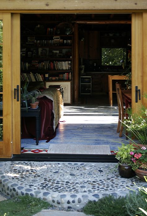 Oh, to have a room like this in my someday house that just opens out into my someday garden. Love the sliding doors. Studio Entrance, Front Door Step, Mosaic Landscape, Rock Floor, Front Door Steps, Shell Mosaic, Mosaic Stained, Stone Walkway, Pebble Mosaic