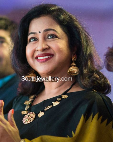 Radhika Saratkumar in a black thread necklace Black Thread Gold Jewellery, Black Thread Jewellery Indian, Black Thread Necklace, Black Beads Mangalsutra Design, Antique Gold Jewelry Indian, Diy Jewelry Earrings, Thread Necklace, Pearl Necklace Designs, Gold Pendant Jewelry