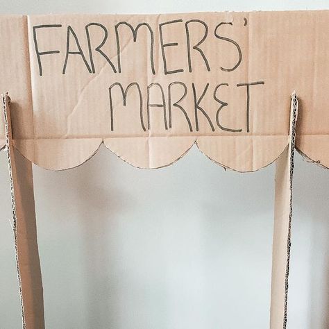 Brittany | Kids/Toddler/Baby Activities on Instagram: "DIY Farmers Market Cardboard boxes can be used to create the most fun imaginative play setups like this farmers market! This activity is a fun way to practice counting. I covered the “grocery list” with contact paper allowing numbers to be written (with dry erase markers) and erased so the kids can play again and again. #kidsactivities #kidsactivity #recycleandplay @recycleandplay #toddleractivities #toddleractivity #cardboardcrafts #ca Farmers Market Games, Farmers Market Toddler Activities, Farmers Market Crafts For Kids, Farmers Market Dramatic Play, Diy Farmers Market, Kindy Classroom, Kids Farmers Market, Farmers Market Stand, Prek Crafts