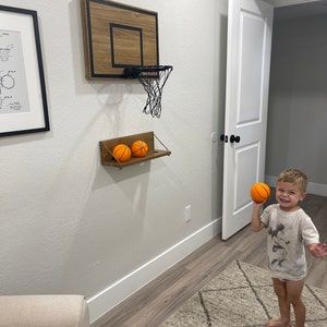 Basketball Hoop On Wall, Basket Ball Hoop In Bedroom, Basement Basketball Hoop, Wood Basketball Hoop, Wooden Basketball Hoop, Diy Basketball Hoop Indoor, Boys Wall Decor Ideas, Basketball Toddler Room, Basketball Themed Nursery