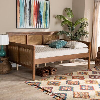 Cultivate a vintage vibe with a boho style in your living room or guest room with this full/double daybed. Made from solid and engineered wood, this daybed features a walnut brown finish that adds warmth to any space. Panels of synthetic cane webbing create a cozy, airy ambiance. We love that this daybed comes with wood slats for mattress support, which eliminates the need for a box spring. Spade feet add a refined touch, making the daybed a stylish and elegant addition to any bedroom space. Mat Double Daybed, Daybed Wood, Full Daybed, Full Size Daybed, Rattan Daybed, Wood Daybed, Upholstered Daybed, Daybed With Trundle, French Inspired