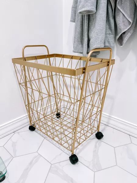 This gold wire basket works great for holding out laundry in our master bathroom! Gold Wire Basket, Towel Basket, Dorm Bathroom, Home Re, Future Room, Wire Basket, Basement Remodel, Fall Home, Wire Baskets