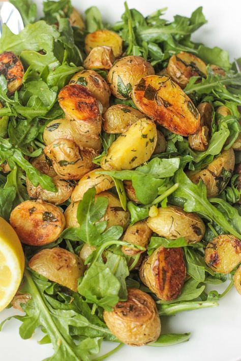 Herb Roasted Potato & Rocket Salad - (Use veggie broth instead of oil) Potato And Arugula Salad, Potato Arugula Salad, Arugula Recipes, Arugula Salad Recipes, Herb Roasted Potatoes, Roasted Potato, Winter Salad, Arugula Salad, Potatoe Salad Recipe