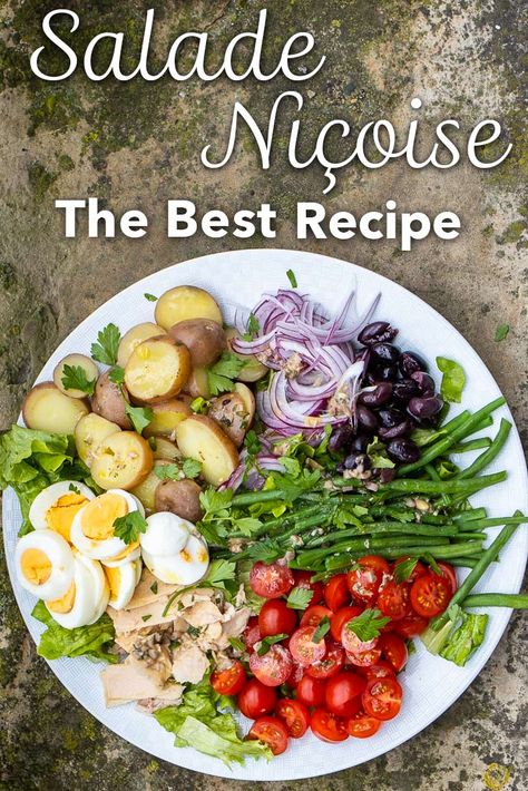 Follow our Salade Nicoise recipe and make the famous composed French salad in your home kitchen. | nicoise salad | nicoice salade | french salad Parisian Salad Recipe, Nicoise Potato Salad, Salmon Salad Nicoise Recipe, Nicoise Salad Dressing Vinaigrette, French Salad Nicoise, French Salads France, French Salad Recipes Simple, French Nicoise Salad, Vegetarian Nicoise Salad