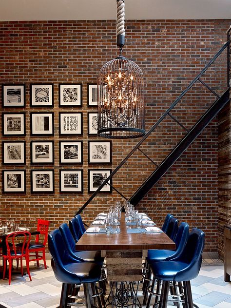 10 Questions With... Glen Coben | People | Interior Design - The dining area at David Burke Fabrick features curated artwork, lighting wrapped in birdcages, communal tables, and an open kitchen framed by reclaimed wood from New York City water towers. #design #interiordesign #interiordesignmagazine #davidburkefabrick #hospitalitydesign #birdcage #lighting #industrial Brick Wall Ideas, Brick Wall Decor, Interior Brick, Brick Interior Wall, Red Brick Wall, Brick Interior, Hang Art, Exposed Brick Walls, Brick Walls