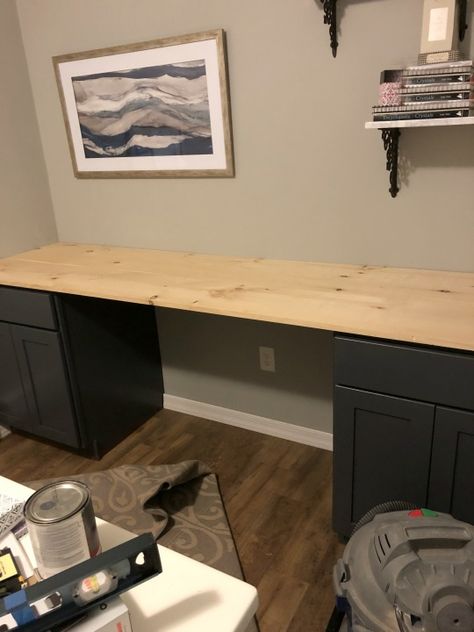 A beautiful but functional impact in my home office. I found these 2 brand new base cabinets on the Facebook Marketplace for a steal at $50. I knew I had to have them even though I didn't know what I wanted to do with them yet.When I got home I just put them in my office to get them out of the way and then realized they would be great in there!I didn't care for the color so I painted them a dark blue/gray with Benjamin Moore Advanced Paint.I separated them on the back wall each one i… Diy Desk With Cabinet Base, Glass Shower Door Cleaner, Easy Kitchen Renovations, Black Cherry Wood, Natural Holiday Decor, Installing Wainscoting, Barn Wall Art, Pretty Storage, Mirror Frame Diy