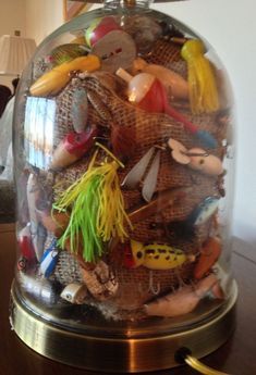 Great way to display my Dad's old fishing lures.  Great way to display my Dad's old fishing lures. Fishing Pole Display Ideas, Fishing Lure Shadow Box Ideas, Fishing Decor Ideas, Lure Display, Vintage Fishing Decor, Fishing Bedroom, Fishing Lures Display, Vintage Lures, Old Fishing Lures