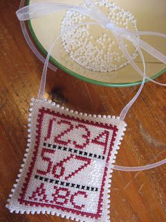 I've been receiving lots of questions about my ornament edgings, so here's how I do them.   Backstitch matching fronts and backs. I always d... Cross Stitch Pattern Maker, Cross Stitch Tutorial, Beaded Edge, Cross Stitch Pillow, Cross Stitch Collection, Stitch Gift, Cross Stitch Christmas Ornaments, Cross Stitch Finishing, Needlepoint Stitches