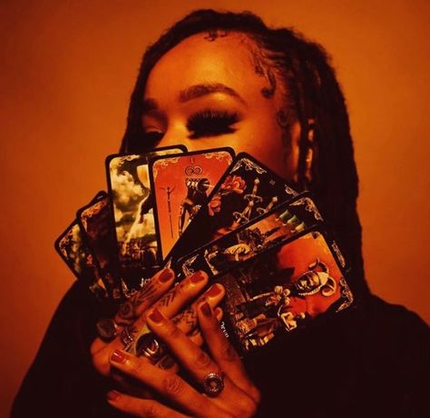 Black tarot reader Black Tarot Reader, Tarot Photoshoot Ideas, Black Witches Aesthetic, Mother Branding, Black Witch Aesthetic, Tarot Photoshoot, Tarot Reader Aesthetic, Witchy Shoot, Money Manifestations