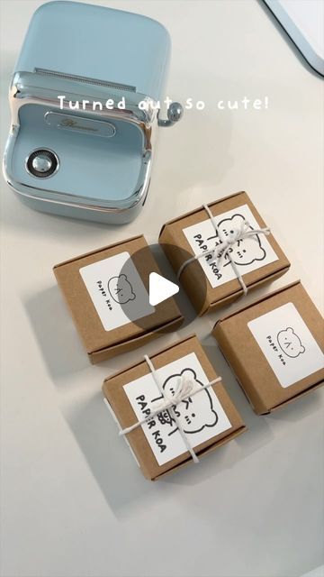 @paperkoa on Instagram: "Trying out @phomemo_official ‘s new m150 label printer to upgrade my small business packaging. The label stickers make my packaging look so much cuter and I’m absolutely in love with the retro sky blue aesthetic of the printer 🩵 

Use code “PAPERKOA” for 10% off your order (link in bio)

Thank you to Phomemo for gifting me this printer!

#smallbusiness #clayartist #clay #smallbusinesspackaging #phomemo #art #polymerclay #packwithme" Sky Blue Aesthetic, Business Packaging, Small Business Packaging, Label Stickers, Label Printer, Blue Aesthetic, Sticker Labels, The Label, Sky Blue