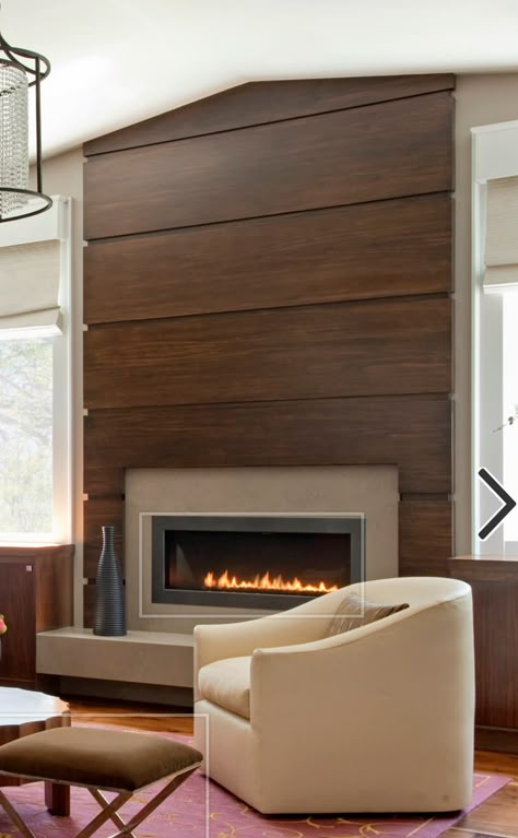 Modern Oak Fireplace Surround, Wood Slats Around Fireplace, Stained Wood Fireplace Wall, Modern Fireplace With Floating Shelves, Wood Veneer Fireplace Wall, Cozy Modern Fireplace, Walnut Fireplace Surround, Wood Fireplace Wall Ideas, Midcentury Modern Fireplace Wall