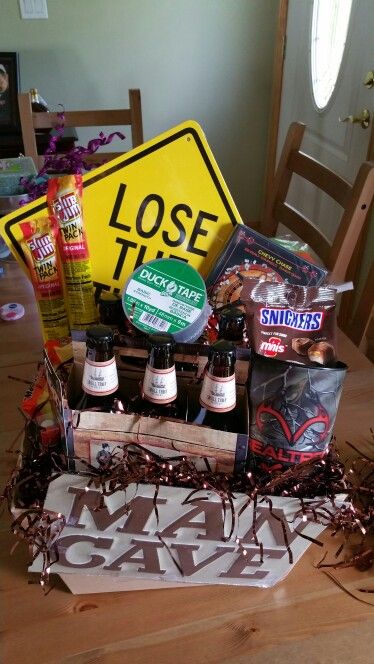 Man Cave raffle basket Man Cave Basket Ideas, Raffle Basket Ideas For Men, Diaper Raffle Prizes Ideas, Casino Royale Party Theme, Tricky Tray Baskets, Tricky Tray, Cheer Banquet, Auction Basket, Poker Party