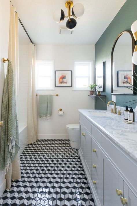 The super plain tiles that previously graced the floors of this bathroom were replaced with smaller black, white, and gray tiles that form a tiny hexagon pattern. Art Deco Bathrooms, Tiny Bath, Affordable Tile, Standing Shower, White Tub, Bathroom Transformation, Art Deco Bathroom, Deco Bathroom, Shower Surround