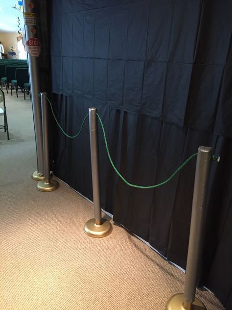 Diy stanchions / velvet rope made out of flag pole holders, pool noodles, silver duct tape, and rope. SonSpark Labs VBS Vbs Diy, Red Carpet Ropes, Shipwrecked Vbs, Flag Pole Holder, Velvet Rope, Consignment Sale, 13th Birthday Parties, Red Rope, Pool Noodles