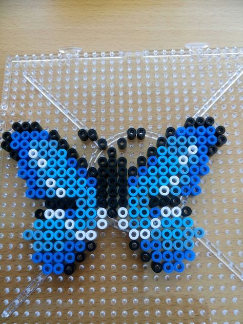 Fjäril. Hama pärlor.   Butterfly. Hama perler beads. Butterfly Melty Beads, Hamma Beads Ideas Butterfly, Fuse Bead Butterfly, Peeler Bead Butterfly, Perler Beads Ideas Butterfly, Iron Beads Butterfly, Hama Beads Patterns Butterfly, Perler Butterfly Pattern, Perler Bead Butterfly Patterns